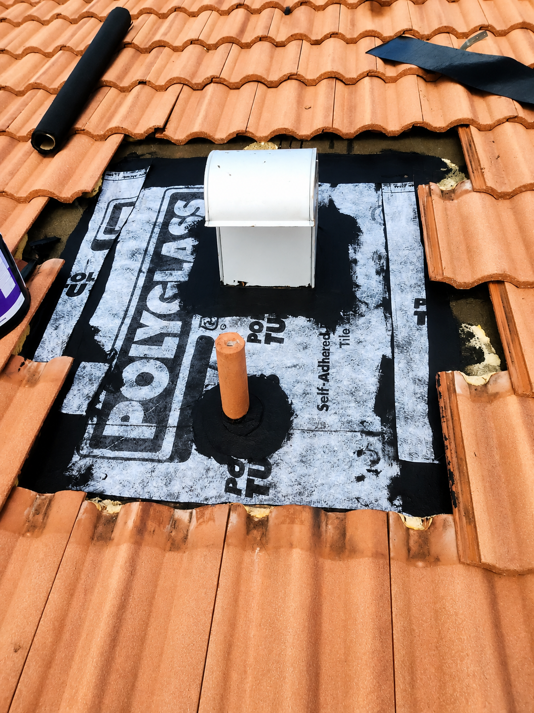 Roof tile replacement